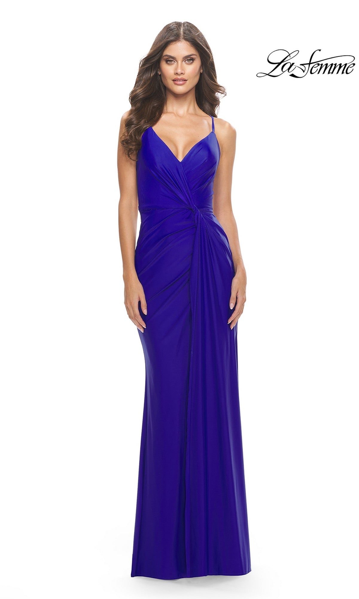 Woman wearing the Twist-Front La Femme Long Formal Dress 31169 in royal blue, floor-length, sleeveless with thin straps, ruched details, and a V-neckline; La Femme logo appears in the top right corner.